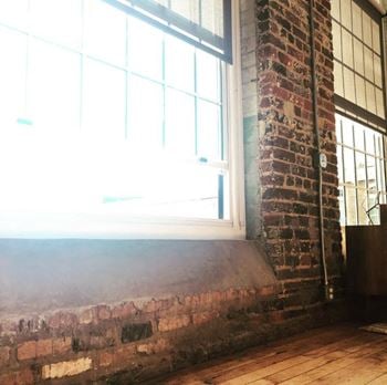 Exposed brick walls*